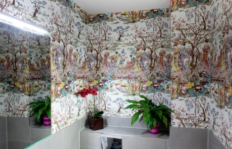 WC / Powder Room with detailed patterned wallpaper