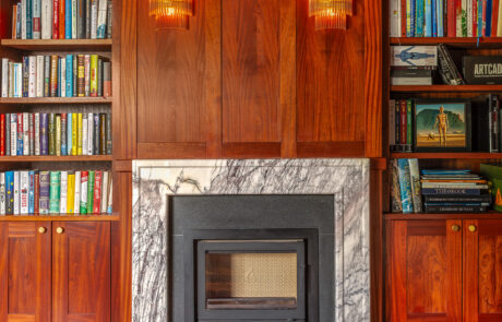 Mahogany panelling with marble fireplace